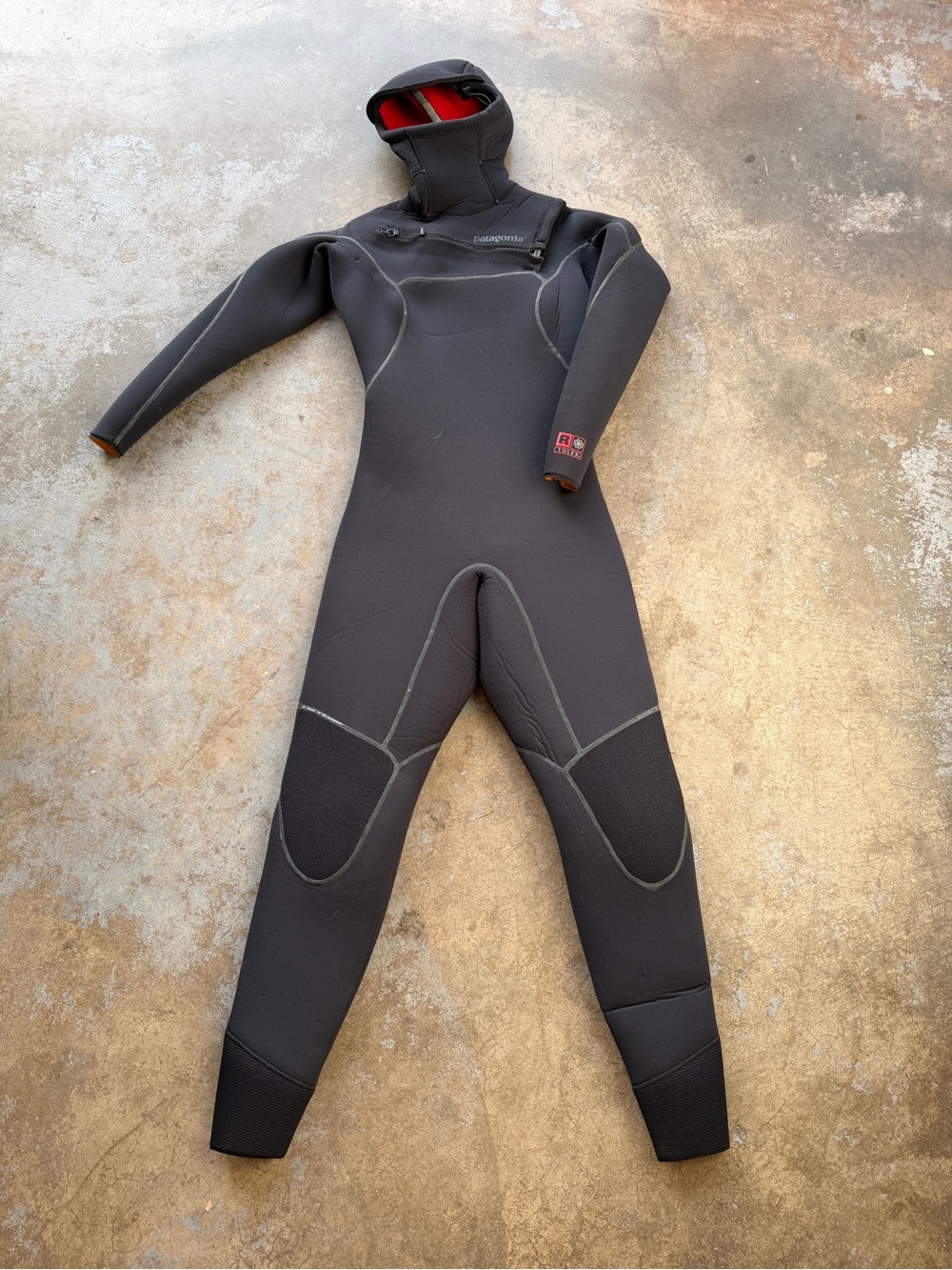 Patagonia Black Wetsuit with Red Hood Lining